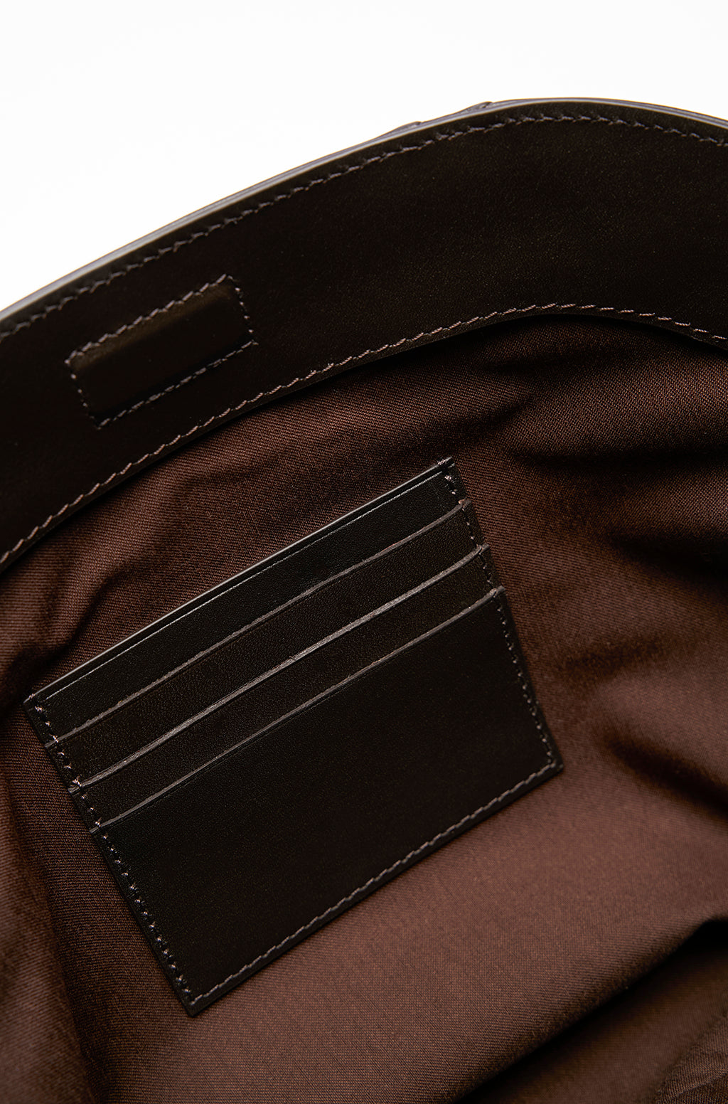 Leather Slouchy Clutch With Metallic Monogram - Image 24