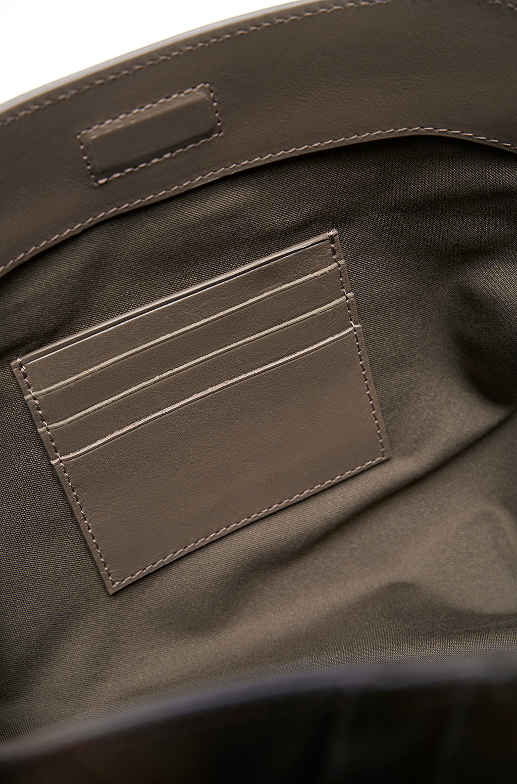 Leather Slouchy Clutch With Metallic Monogram - Image 12