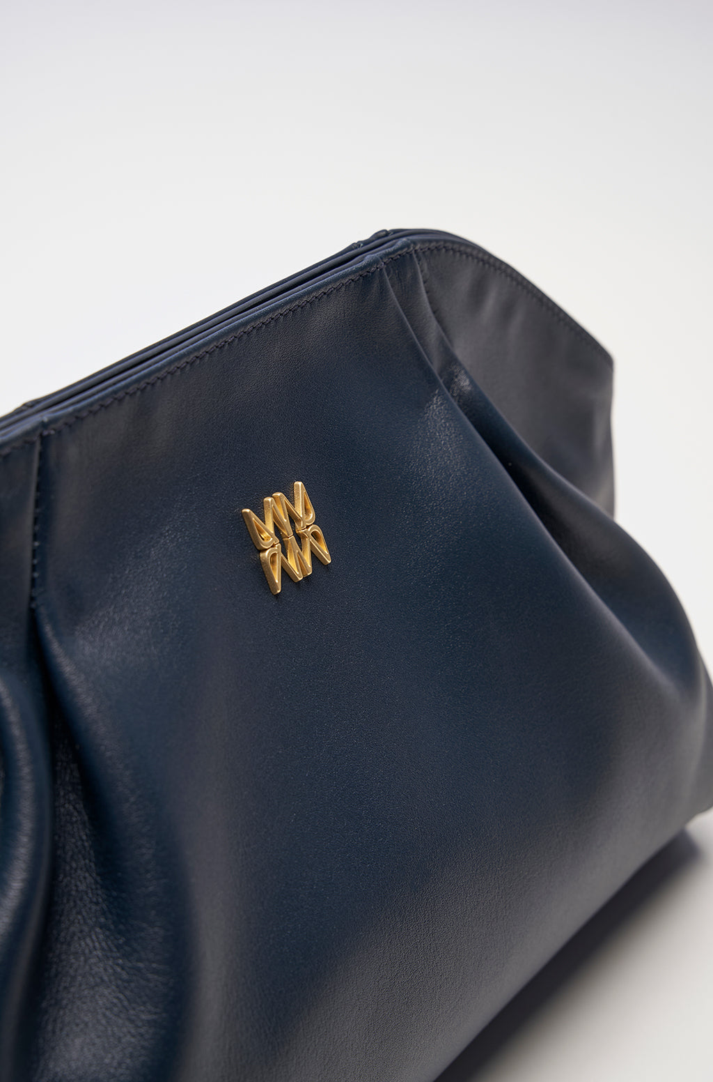 Leather Slouchy Clutch With Metallic Monogram - Image 16