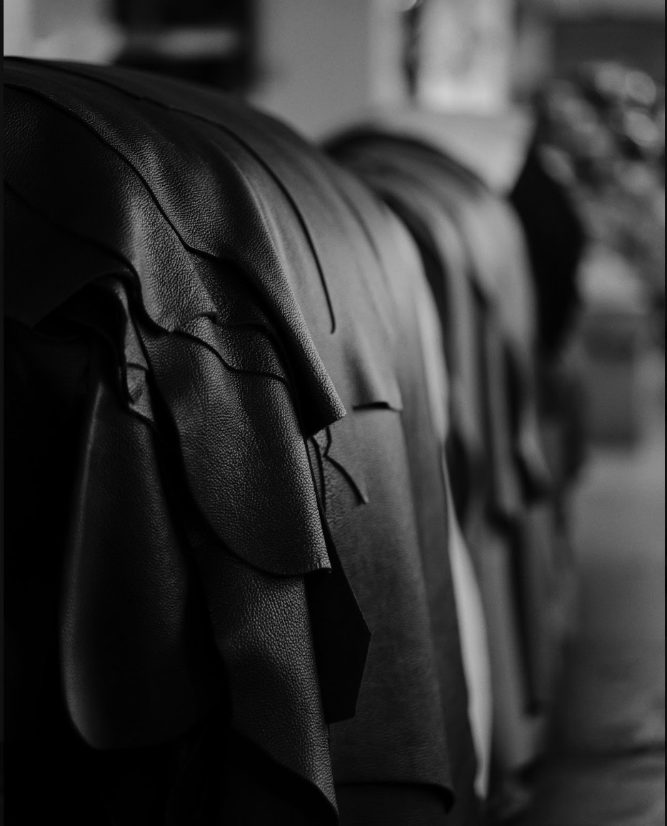 Leather hides hanging in the atelier